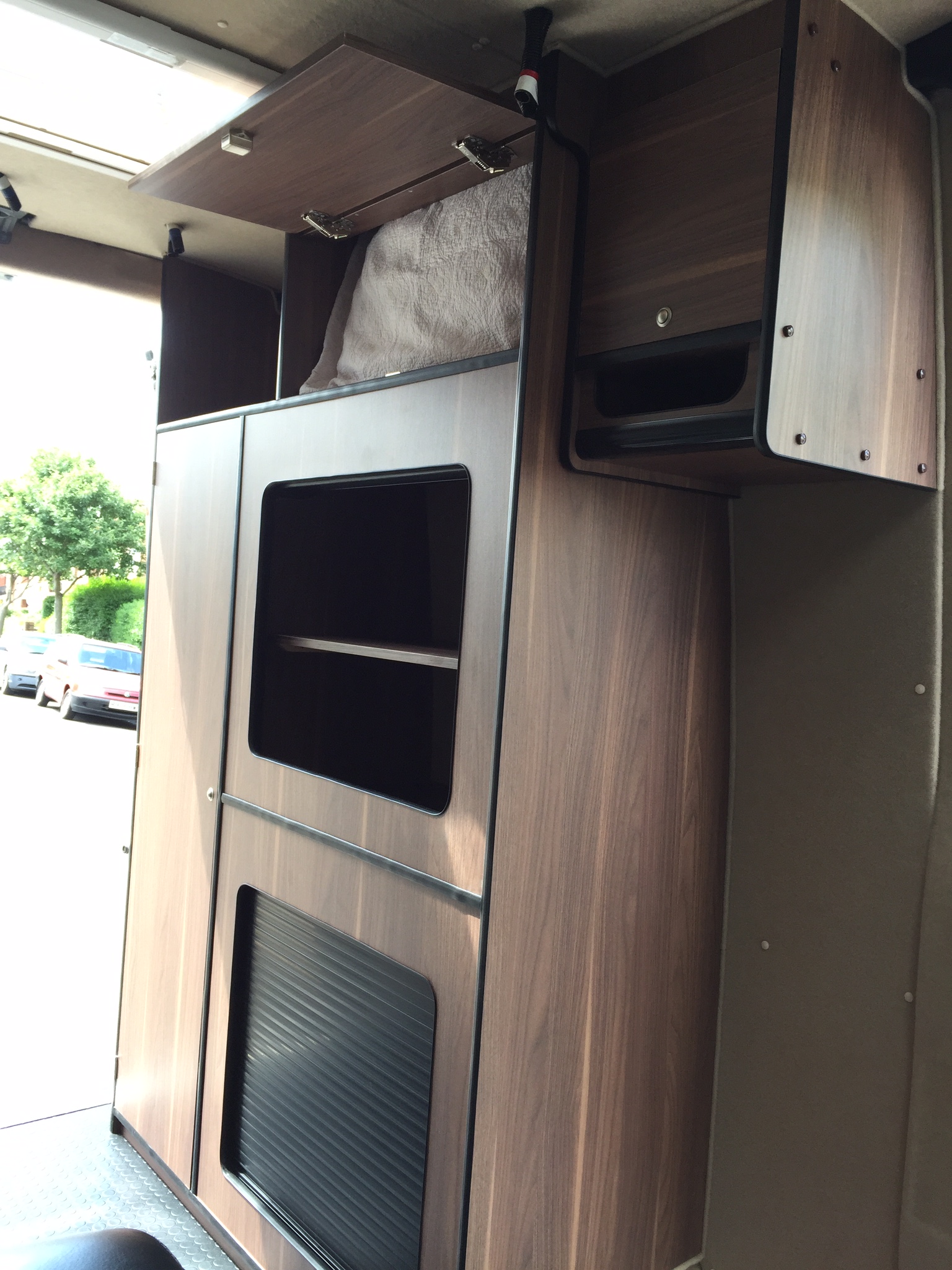 Storage cupboards with tambour doors